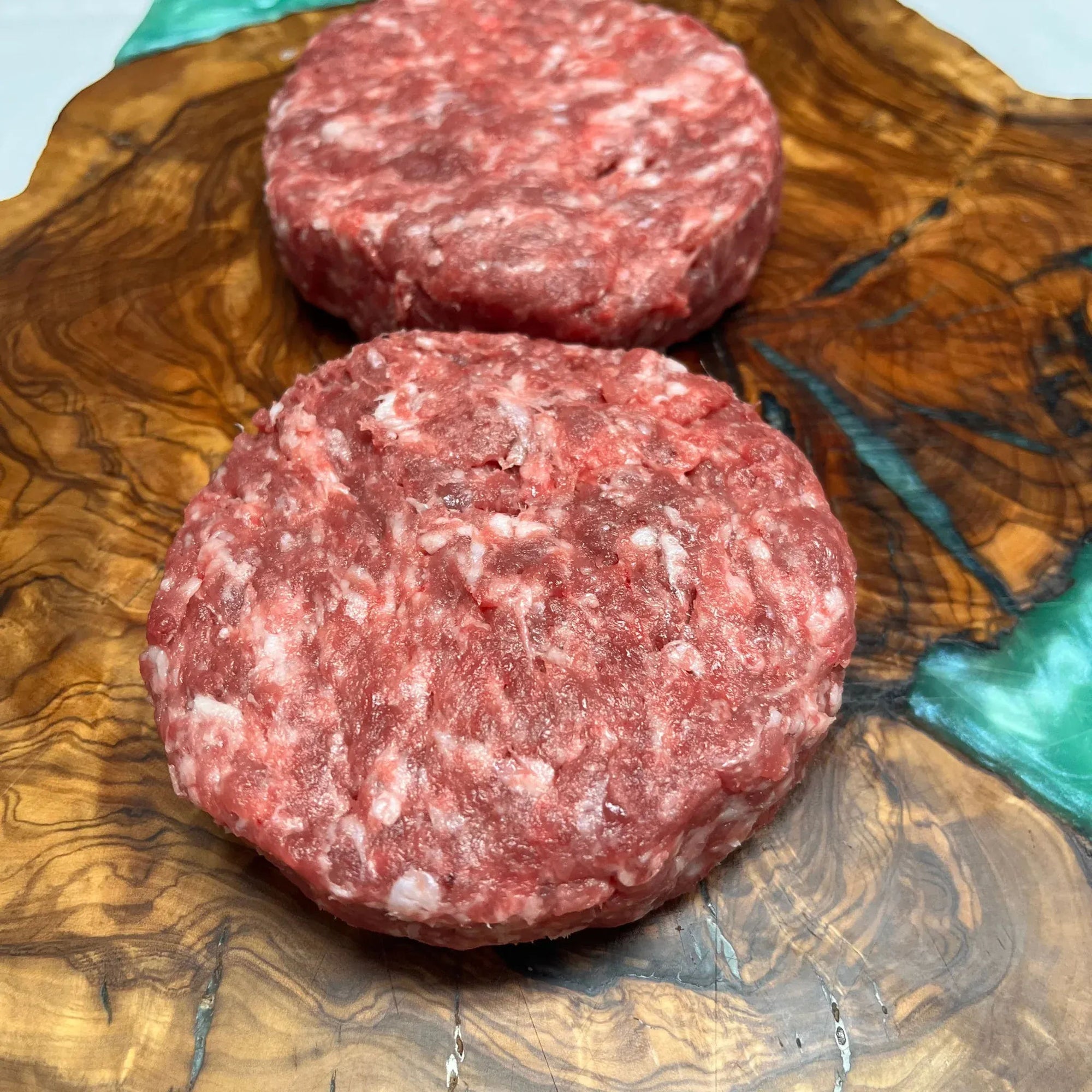4 Hamburguesas de secreto 100% natural de 200 gr/un. En 2 paquetes.