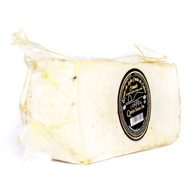 Cured raw goat's milk cheese in EVOO Half cheese
