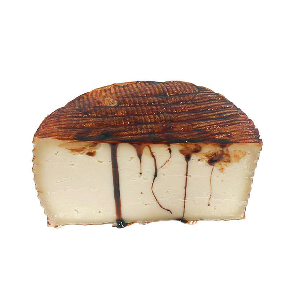 Goat cheese cured with Amontillado wine