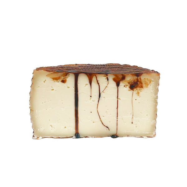 Sheep cheese cured with Orange Sun Wine