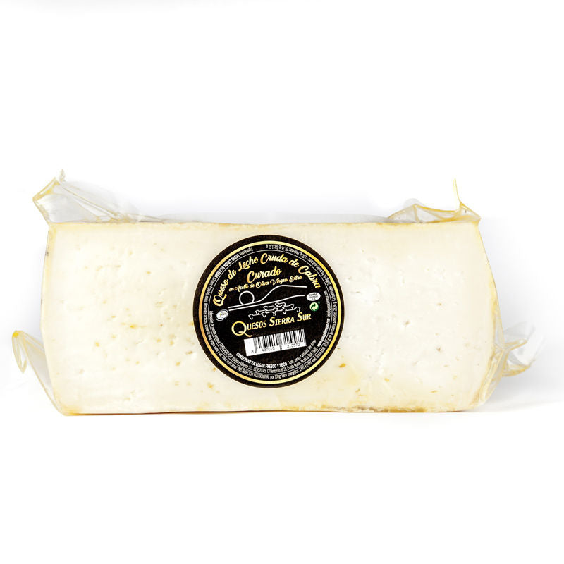 Cured raw goat's milk cheese in EVOO Half cheese