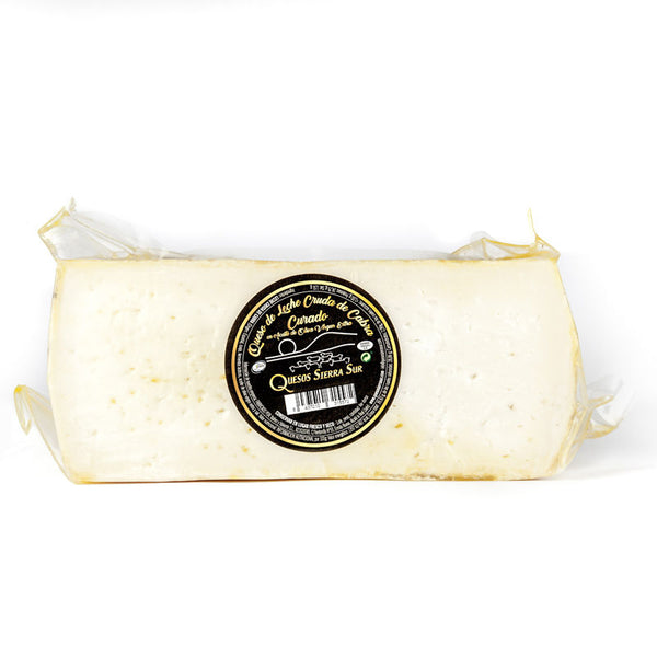 Cured raw goat's milk cheese in EVOO Half cheese