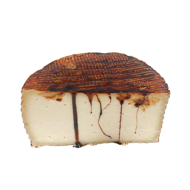 Sheep cheese cured with Orange Sun Wine